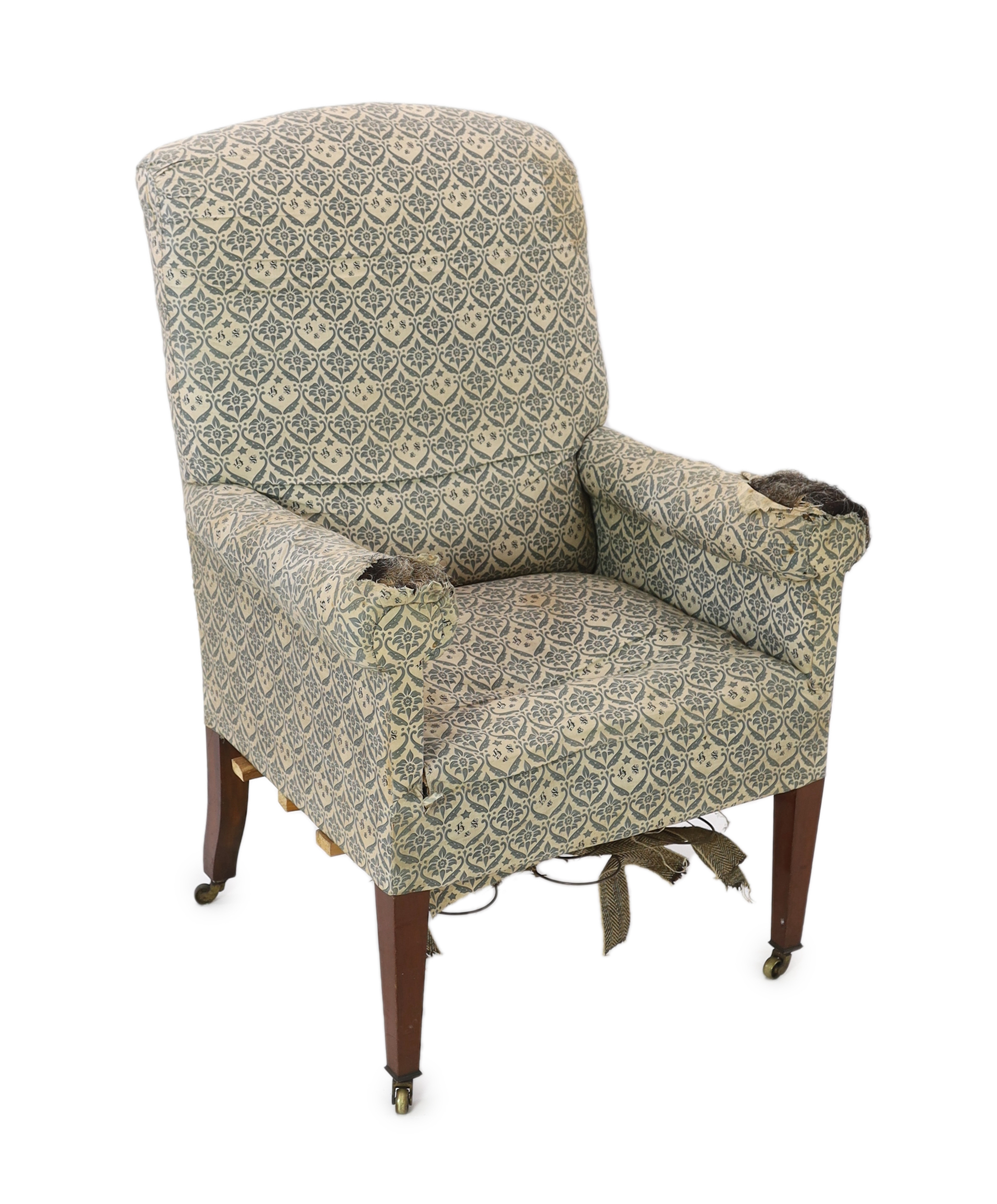 A late Victorian Howard & Sons armchair, width 80cm, depth 80cm, height 115cm